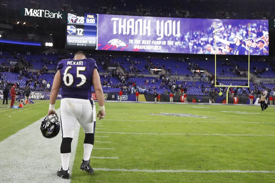 Baltimore Ravens offensive guard Patrick Mekari (65) leaves the field after an NFL divisional playoff football game against the Tennessee Titans, Saturday, Jan. 11, 2020, in Baltimore. The Titans won 28-12. (AP Photo/Julio Cortez)