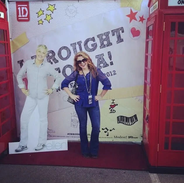 The author celebrating One Direction's second album release. (Photo: Courtesy of Claire Cook)