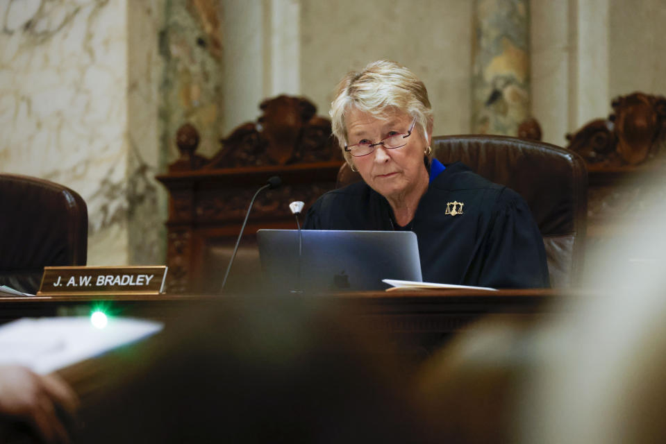 Wisconsin Supreme Court Justice Ann Walsh Bradley listens to arguments during a redistricting hearing at the Wisconsin state Capitol Building in Madison, Wis., on Tuesday, Nov. 21, 2023. (Ruthie Hauge/The Capital Times via AP, Pool)