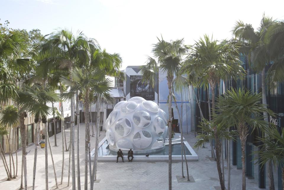 FILE - This Oct. 30, 2015 file photo shows a 24-foot version of inventor Buckminster Fuller’s Fly’s Eye Dome on display in Miami's Design District. A 50-foot version of the futuristic dome is scheduled to be installed on the grounds of the Crystal Bridges Museum of American Art in Bentonville, Ark., in the summer of 2017. (AP Photo/Wilfredo Lee)