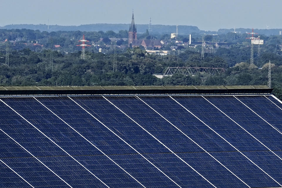 FILE - Solar panels are installed on a coal mixing hall of the former coal mine Auguste Victoria in Marl, Germany, Sept. 7, 2023. (AP Photo/Martin Meissner, File)