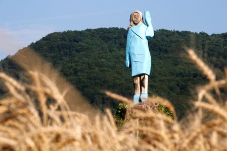 Life-size wooden sculpture of U.S. first lady Melania Trump is officially unveiled in Rozno, near her hometown of Sevnica