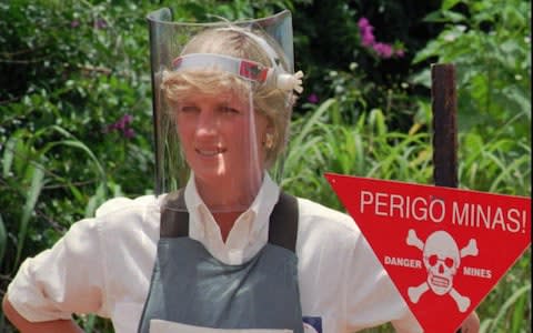 Diana, Princess of Wales, in Angola in 1997 - Credit: AP