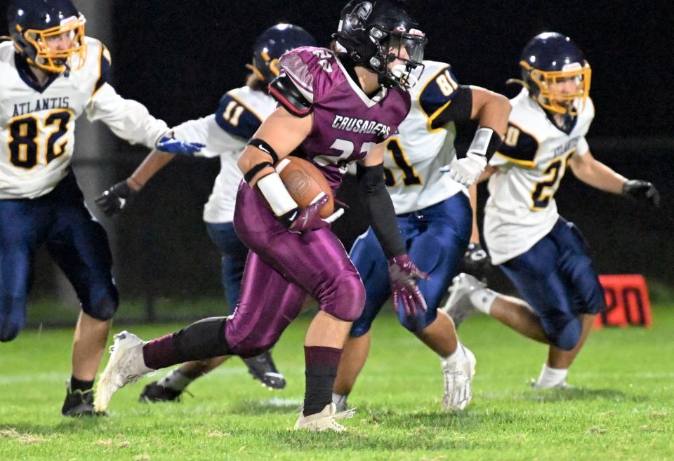 Peyton Morris of Cape Tech turns up field against Atlantis Charter school on their new field.