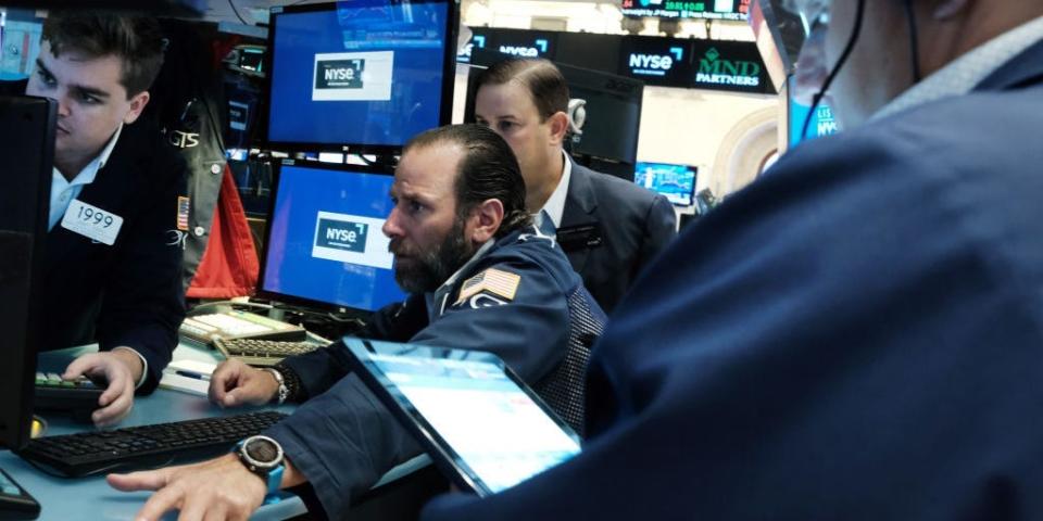 Traders on the floor of the New York Stock Exchange (NYSE)