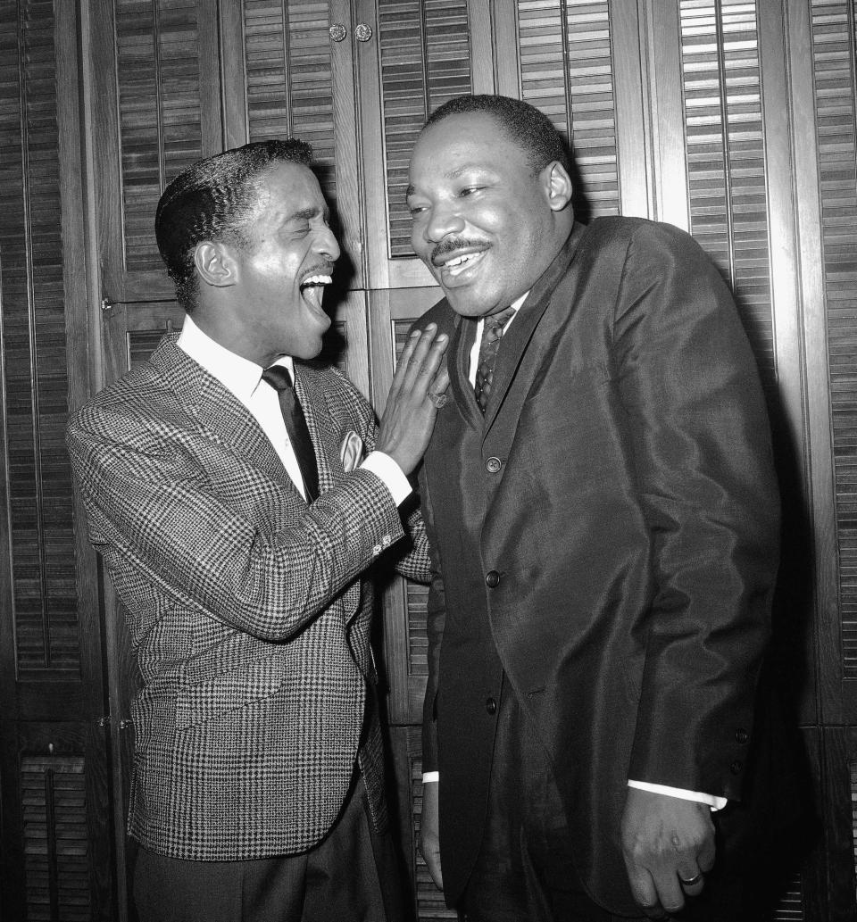 Rev. Dr. Martin Luther King and Entertainer Sammy Davis Jr share a laugh in Davis' dressing room at New York's Majestic Theatre March 4 1965 after the Nobel Prize winning civil rights leader attended a performance of the Musical play "Golden Boy" in which Davis has the title role. (AP Photo/Dave Pickoff) ORG XMIT: APHS82614 [Via MerlinFTP Drop]