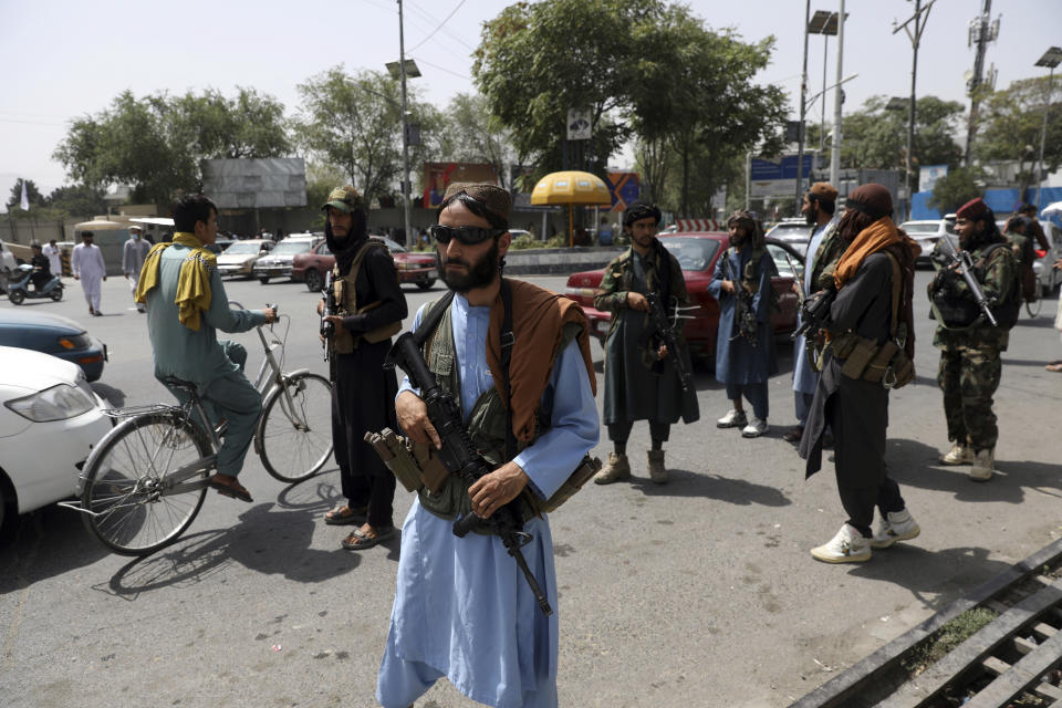 Taliban fighters patrol in the Wazir Akbar Khan neighborhood in the city of Kabul, Afghanistan, Wednesday, Aug. 18, 2021. The Taliban declared an "amnesty" across Afghanistan and urged women to join their government Tuesday, seeking to convince a wary population that they have changed a day after deadly chaos gripped the main airport as desperate crowds tried to flee the country. (AP Photo/Rahmat Gul)