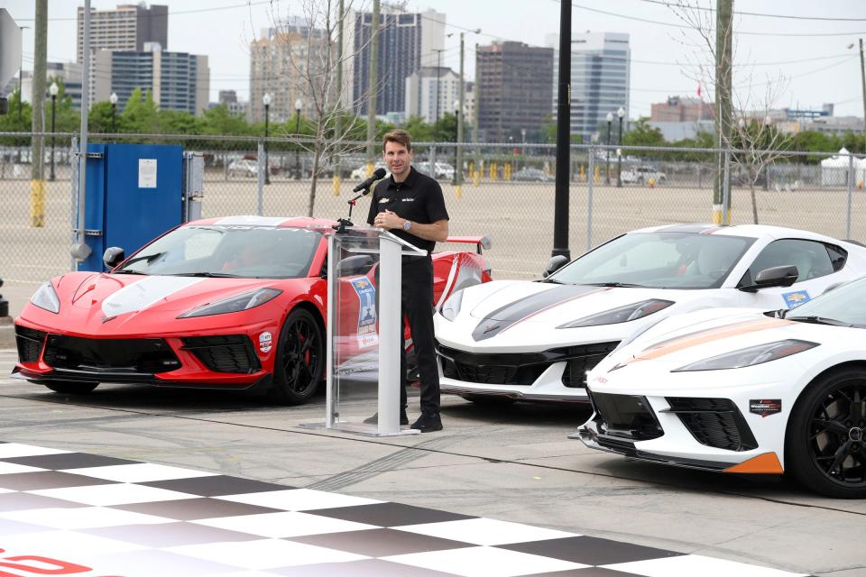 A Detroit Grand Prix ceremony, moving from Belle Isle to downtown was held Monday, June 6, 2022. Three Corvettes ever escorted by police down Jefferson and around the new course ending up at the new finish line at Franklin and Schweister. IndyCar driver Will Power, the winner of the 2022 Detroit Grand Prix, talks about the race's move from Belle Isle to Detroit, on Monday, June 6, 2022, at the site of the new finish line on Franklin and Schweizer Place.