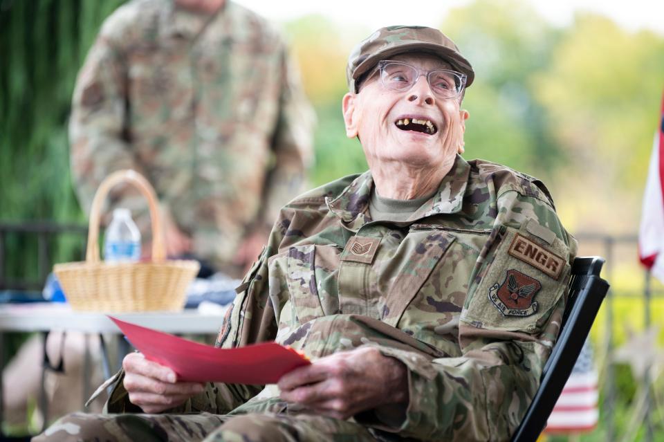 Veteran Bob Munie is reenlisted into the Air National Guard for his 100th birthday at Lakeview Assisted Living in Battle Creek on Thursday, Oct. 6, 2022.