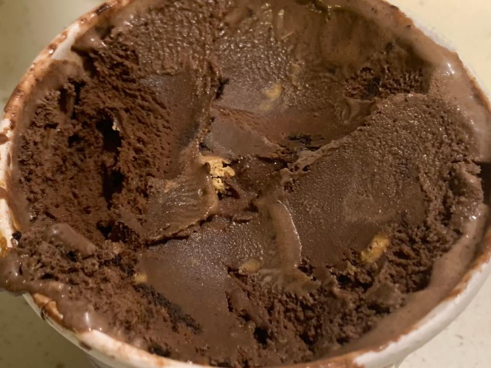Brown Trader Joe's peanuts for chocolate ice cream scooped from carton