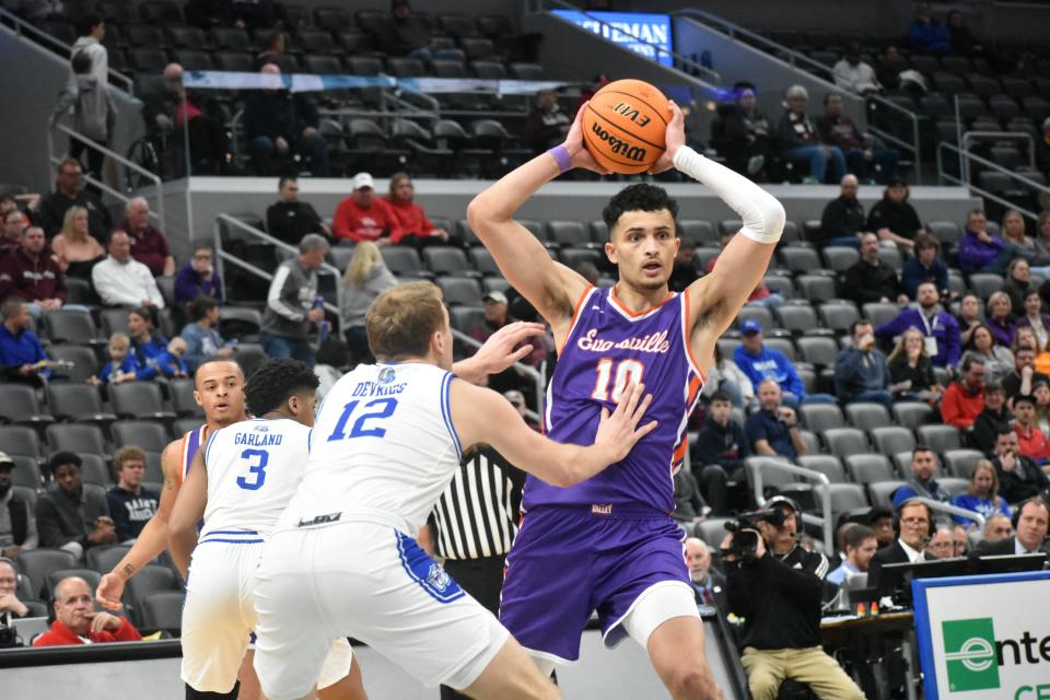 Evansville's Yacine Toumi looks to pass during Friday's Missouri Valley Conference tournament quarterfinals against Drake.