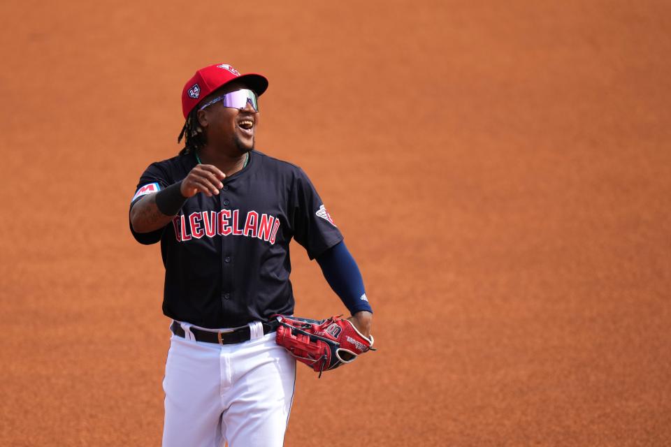 Cleveland Guardians third baseman Jose Ramirez (11) smiles as he takes the field during a spring training game against the Cincinnati Reds on Feb. 24 in Goodyear, Ariz.