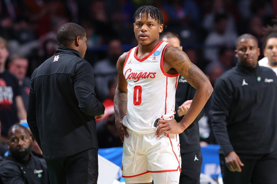 Marcus Sasser of the Houston Cougars talks with a coach during the first half against the Auburn Tigers on March 18. (Kevin C. Cox/Getty Images)