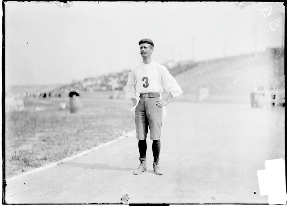 Felix stands in the Olympic stadium