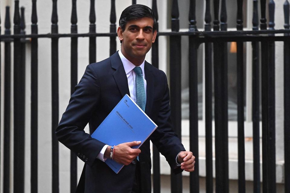 <p>Britain's Chancellor of the Exchequer Rishi Sunak leaves 11 Downing Street ahead of his spending review speech in the Commons</p>AFP via Getty Images