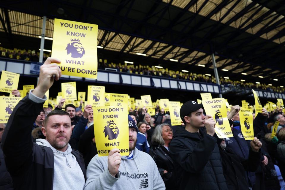 Everton fans protested against their ten-point deduction, which has been reduced to six  (Getty Images)