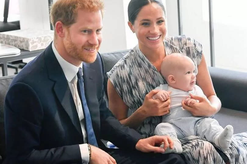 Prince Harry, Duke of Sussex, Meghan, Duchess of Sussex and their baby son Archie Mountbatten-Windsor