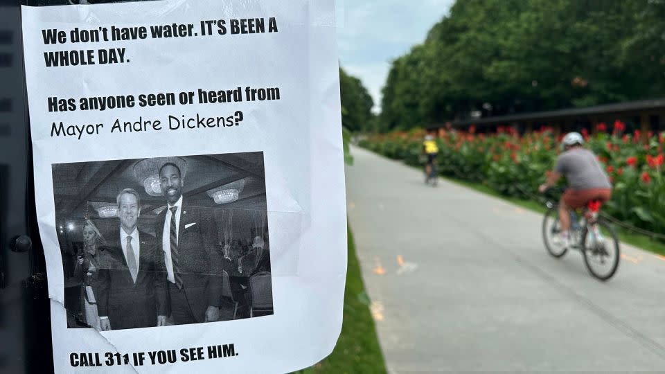 A sign hangs along the Beltline trail in Atlanta's Reynoldstown neighborhood on Saturday, after water main breaks interrupted water service across the city. - Kate Brumback/AP