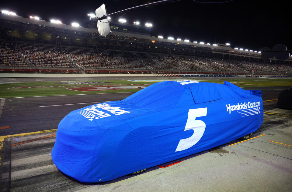 Kyle Larson never got to drive his No. 5 car -- seen here under cover during the Coca-Cola 600 Weather delay. (Photo by Jared C. Tilton/Getty Images)