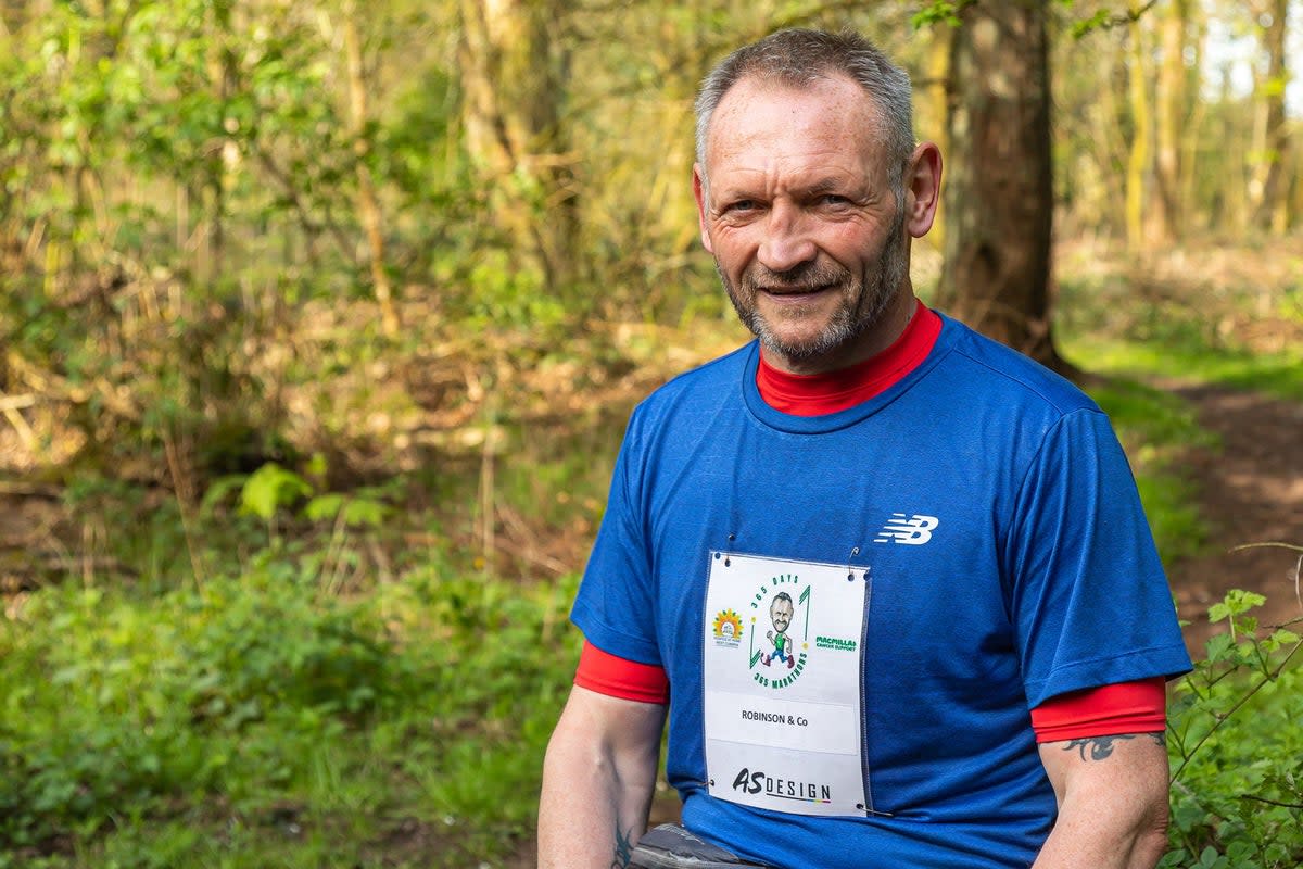 Gary McKee, 53, who is running a marathon every day this year to raise money for Macmillan Cancer Support and Hospice at Home West Cumbria (Carlos Reina/PA) (PA Media)