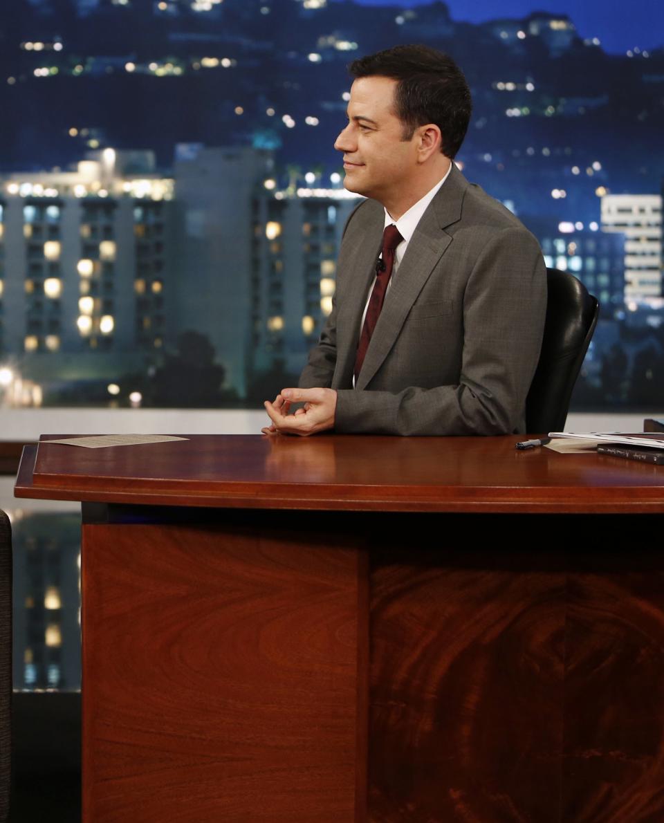 Jimmy sitting at his desk on the show