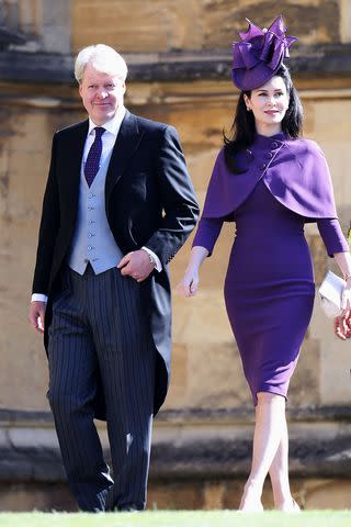 <p>CHRIS JACKSON/AFP/Getty</p> Charles Spencer and Karen Spencer attend the wedding of Prince Harry and Meghan Markle on May 19, 2018