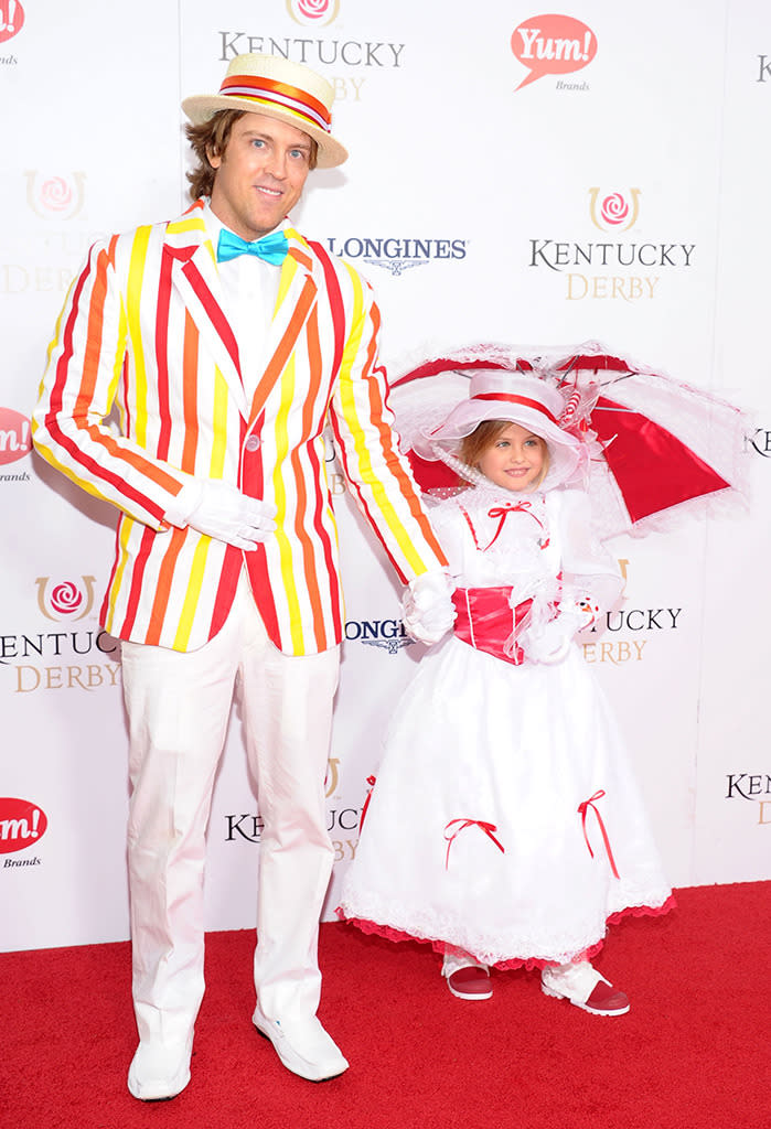 Dad and daughter chose a Mary Poppins theme for their 2013 ensembles. She was Mary, of course, and he was Bert, just as audiences saw them in the “Jolly Holiday” section of the classic Disney movie. (Photo: Michael Loccisano/Getty Images)