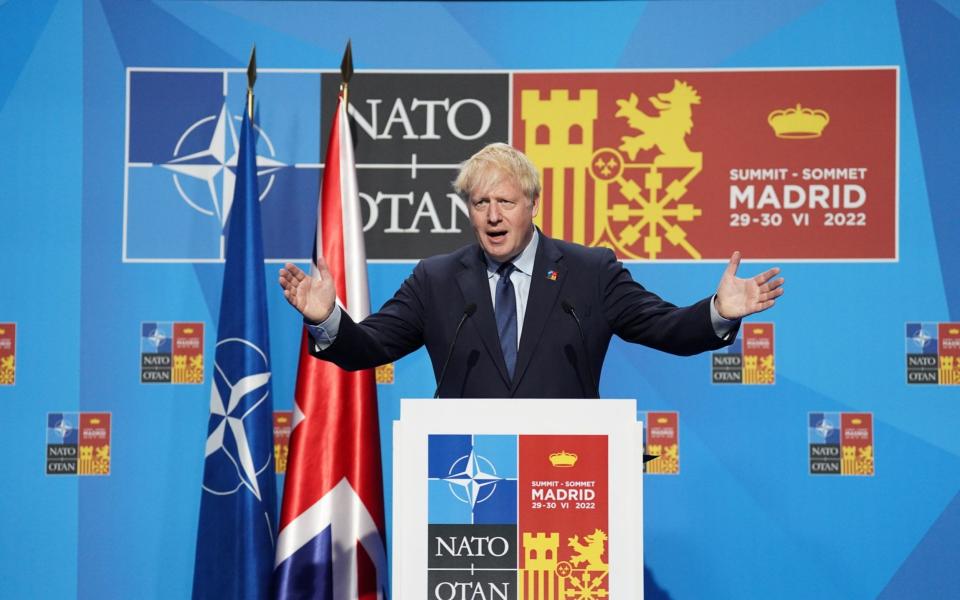 Boris Johnson is pictured holding a press conference in Madrid, Spain, today - Stefan Rousseau /PA