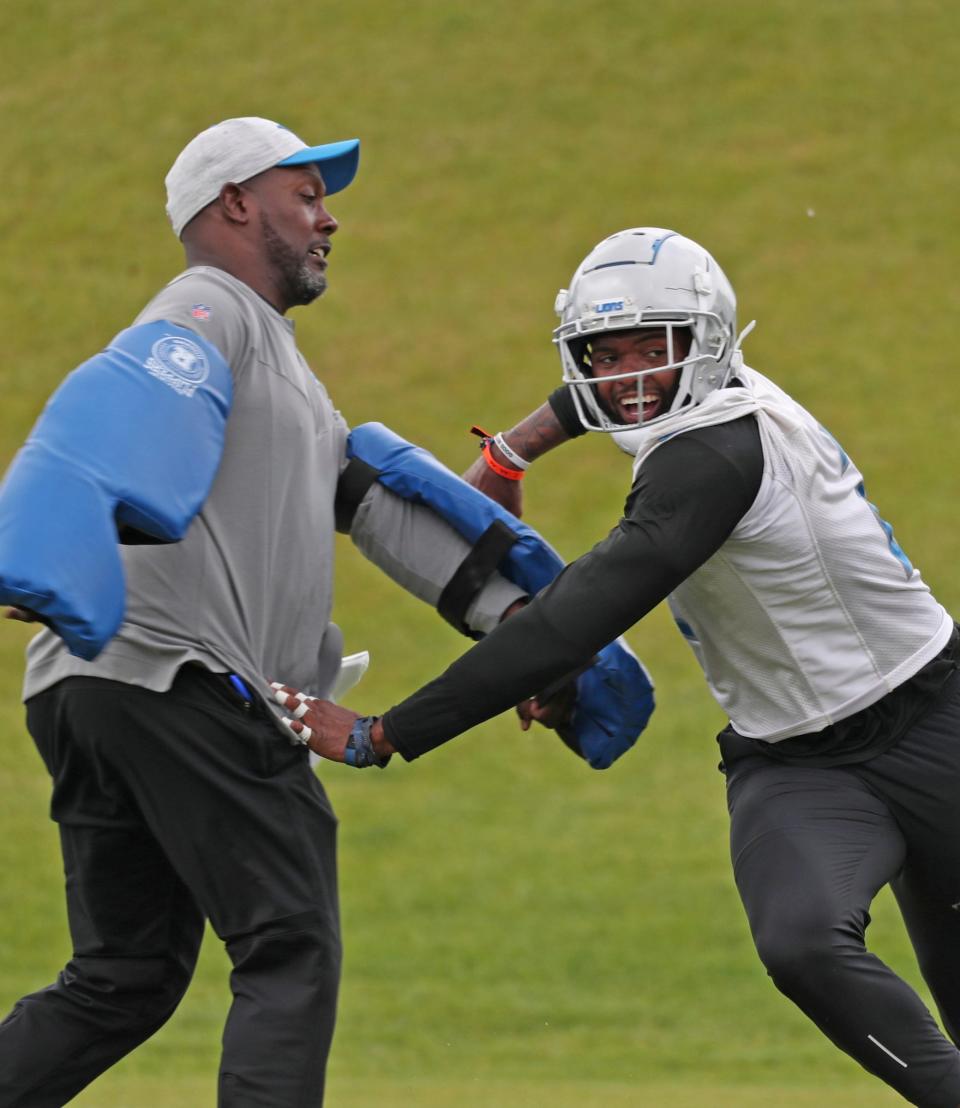 Detroit Lions linebacker Austin Bryant goes through drills during OTAs on Thursday, May 26, 2022 at the team practice facility in Allen Park.