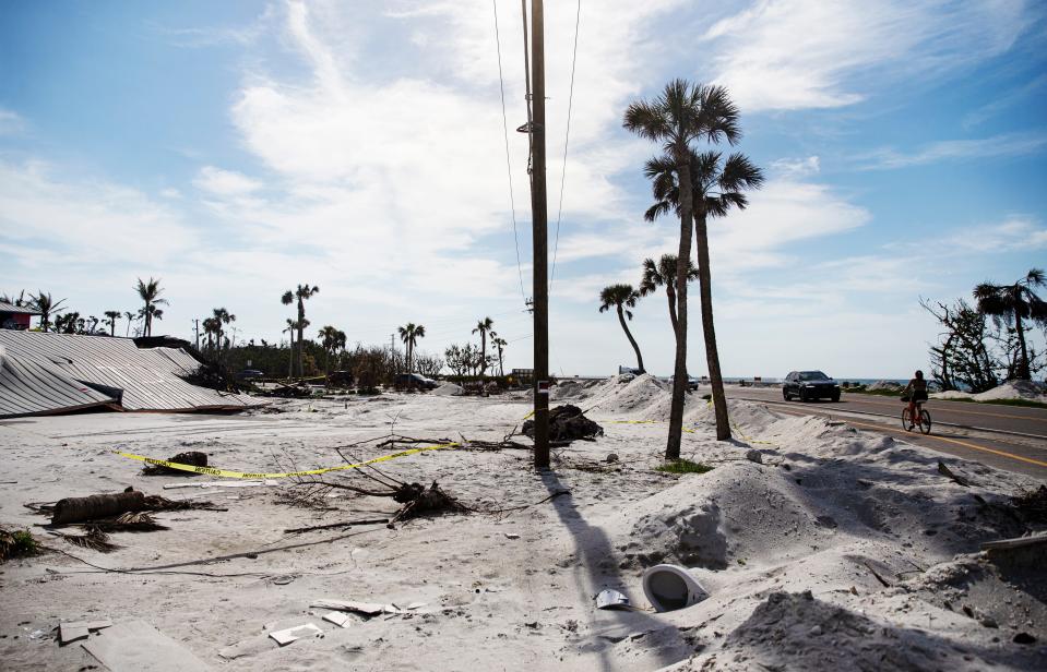 The Santiva General Store sits flattened after Hurricane Ian destroyed it more than three months ago on Sanibel Island on Wednesday, Jan. 4, 2023. 