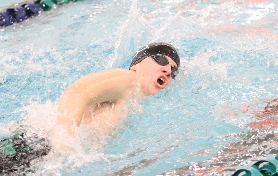Northridge's Travis Allen swims in the 400 freestyle relay during a meet with Granville, Johnstown and Grandview Heights on Monday.