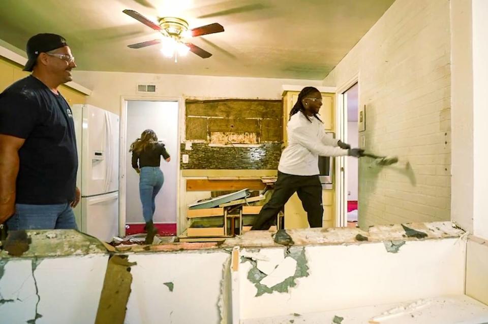 Las Vegas Raiders All-Pro wide receiver Davante Adams trades his football for a sledgehammer as he gifts his grandmother, Bettie, who helped raise him, a modern upgrade to her East Palo Alto, Calif., home where he grew up.
