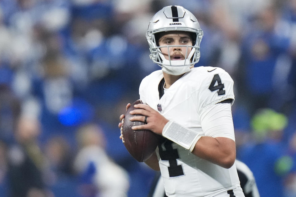 Las Vegas Raiders quarterback Aidan O'Connell (4) prepares to throw a pass during the first half of an NFL football game against the Indianapolis Colts, Sunday, Dec. 31, 2023, in Indianapolis. (AP Photo/AJ Mast)