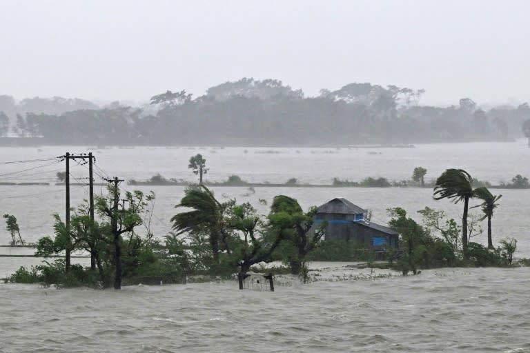 Marooned houses in Bangladesh are seen during heavy rainfall in Patuakhali on May 27 after Cyclone Remal (Munir Uz Zaman)