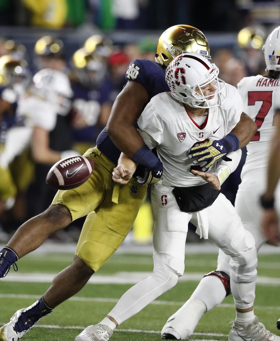 Notre Dame defensive lineman Jerry Tillery sacks Stanford quarterback K.J. Costello during the second half of an NCAA college football game Saturday, Sept. 29, 2018, in South Bend, Ind. (AP Photo/Carlos Osorio)