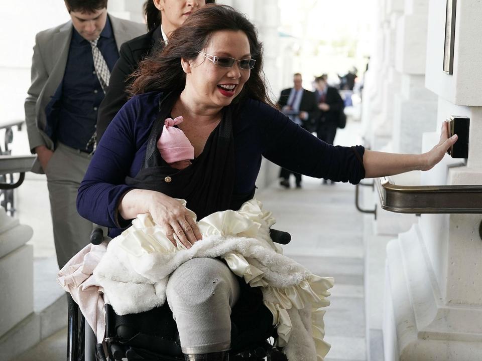 US senator brings her newborn baby to work to cast historic vote