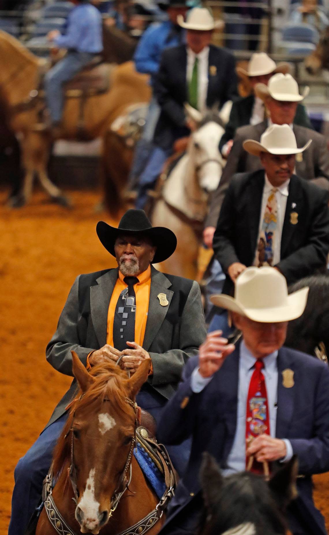 Cleo Hearn, left, founder and producer of the Cowboys of Color Rodeo, participates in the grand entry on Jan. 15, 2018, in Fort Worth.