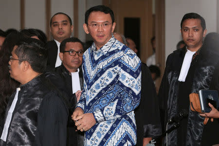 FILE PHOTO: Jakarta Governor Basuki Tjahaja Purnama is seen inside a court during his trial for blasphemy in Jakarta, Indonesia May 9, 2017 in this photo taken by Antara Foto. Antara Foto/Sigid Kurniawan/via REUTERS/File Photo