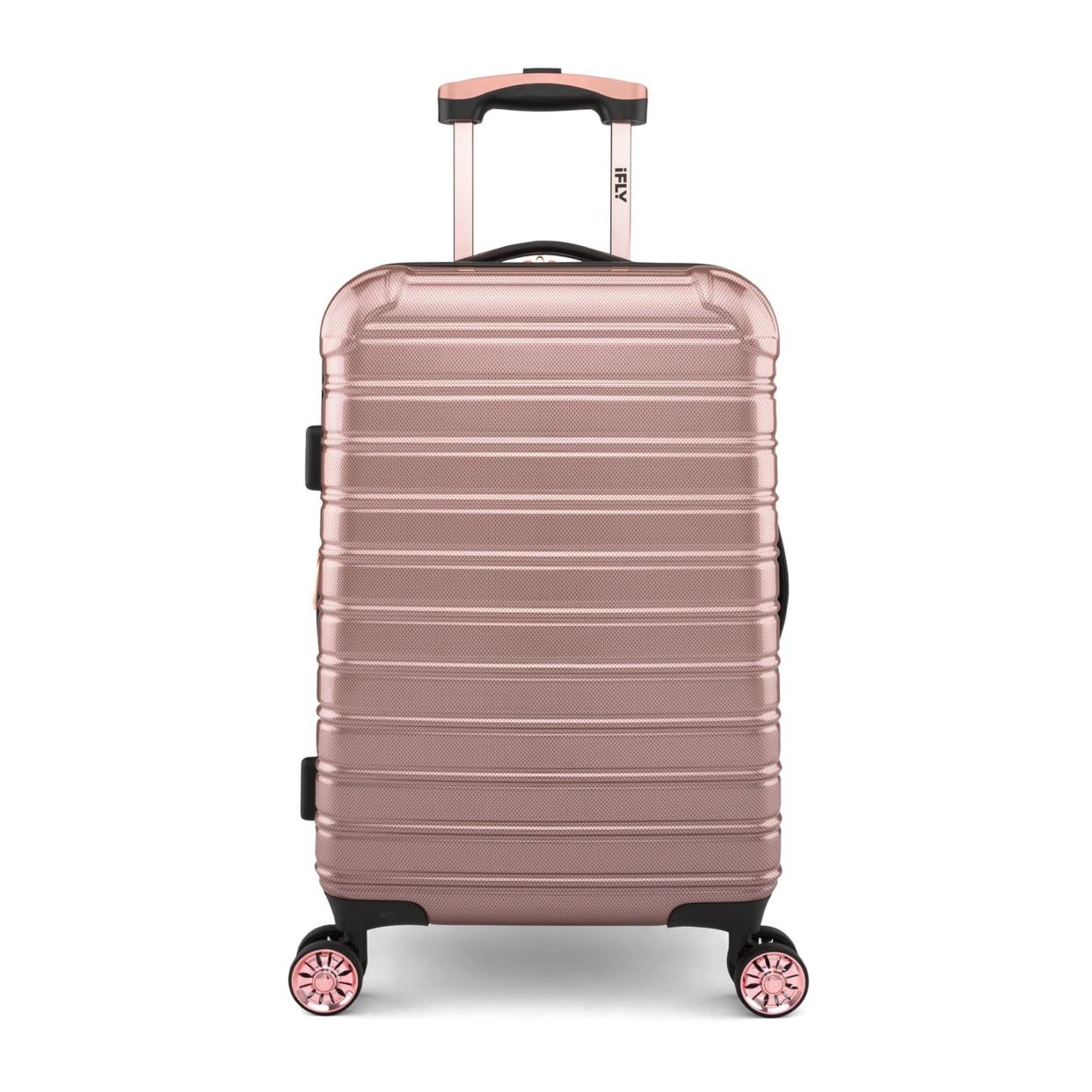 <p><a href="https://go.redirectingat.com?id=74968X1596630&url=https%3A%2F%2Fwww.walmart.com%2Fip%2FiFLY-Hardside-Fibertech-Carry-On-Luggage-20-Rose-Gold%2F264608430%3Ffrom%3D%252Fbrowse%252F%255B...seo%255D&sref=https%3A%2F%2Fwww.thepioneerwoman.com%2Fhome-lifestyle%2Fg43904720%2Fbest-walmart-luggage-deals%2F" rel="nofollow noopener" target="_blank" data-ylk="slk:Shop Now;elm:context_link;itc:0;sec:content-canvas" class="link rapid-noclick-resp">Shop Now</a></p><p>iFLY Hardside Fibertech Carry-On Luggage</p><p>$88.00</p><span class="copyright">Walmart</span>