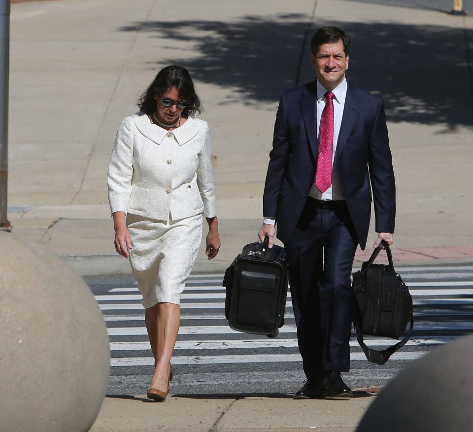 State Auditor Kathy McGuiness (left) arrives at the Leonard L. William Justice Center.  Her trial on corruption charges began on Monday.