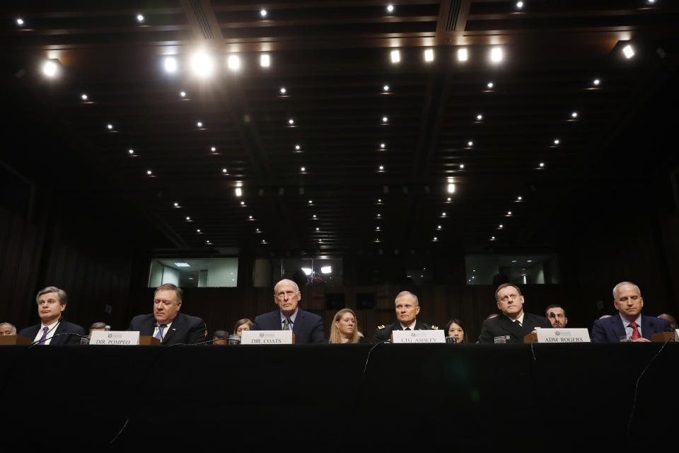 FBI Director Christopher Wray, CIA Director Mike Pompeo, Director of National Intelligence Dan Coats, Defense Intelligence Agency Director Robert Ashley, National Security Agency Director Michael Rogers and National Geospatial-Intelligence Agency Director Robert Cardillo testify before the Senate Intelligence Committee on Tuesday. (Photo: Leah Millis/Reuters)