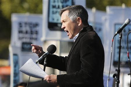 Former U.S. Representative Dennis Kucinich (D-OH) addresses the "Stop Watching Us: A Rally Against Mass Surveillance" near the U.S. Capitol in Washington, October 26, 2013. REUTERS/Jonathan Ernst