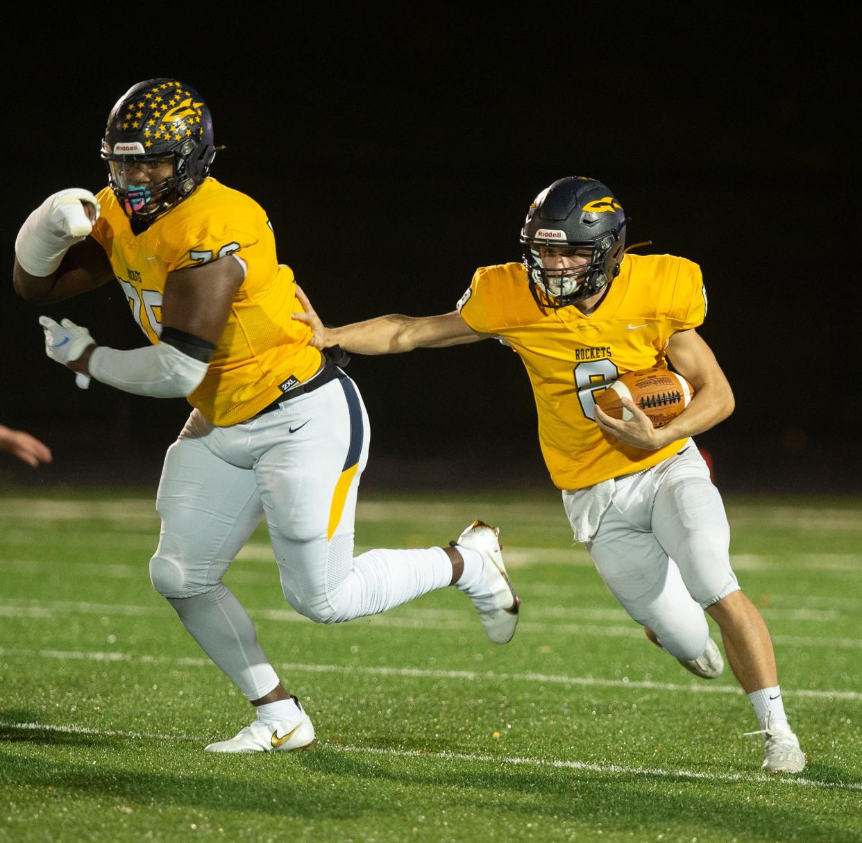 Streetsboro hosted Dover, game was postponed with 9:51 left in the second quarter, Rockets lead the Tornadoes 12-7. Michael Hall Jr. blocks for quarterback Maysun Klimak.