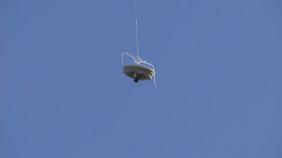 NASA's inflatable flying saucer, called the Low-Density Supersonic Decelerator, lifts off on the second test flight of Mars landing technologies on June 8, 2015. The inflatable decelerator also includes the largest supersonic parachute ever mad