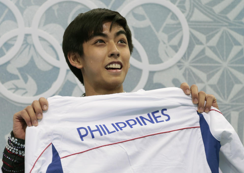 Michael Christian Martinez of the Philippines waits for his results after the men's free skate figure skating final at the Iceberg Skating Palace at the 2014 Winter Olympics, Friday, Feb. 14, 2014, in Sochi, Russia. (AP Photo/Ivan Sekretarev)