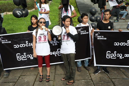 Thinzar Shun Lei Yi (L) speaks at a march for press freedom in Yangon, Myanmar, September 1, 2018. Picture taken September 1, 2018. REUTERS/Ann Wang