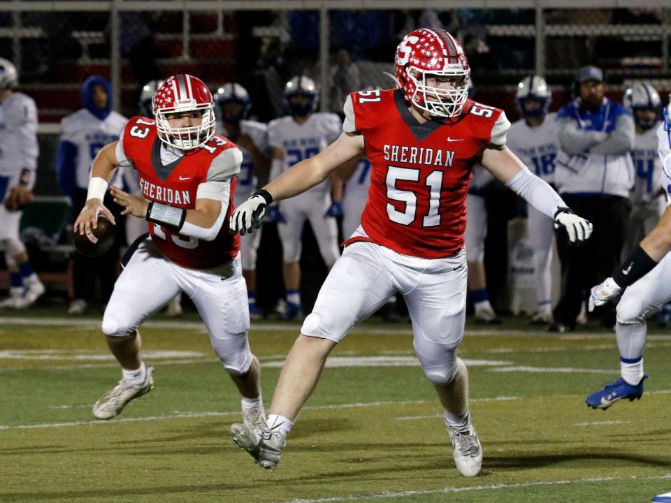 Senior Cole Davis leads the way for quarterback Caden Sheridan on a pass play during Sheridan's 42-0 win against Gallipolis Gallia Academy in a Division IV, Region 15 quarterfinal on Nov. 3. Davis made first team All-Ohio and Caden Sheridan was a second-team selection in Division IV for the Generals.