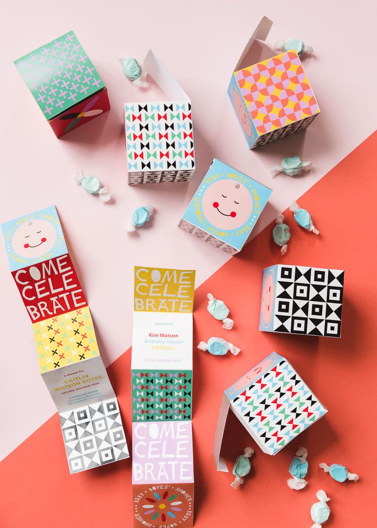 invites with fun patterns that fold up into cube boxes are a great baby shower idea