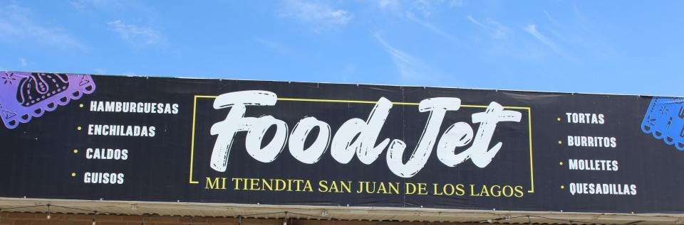 A sign on National Parks Highway south of Carlsbad indicates the kind of food offered at Mi Tiendita San Juan de Los Lagos.