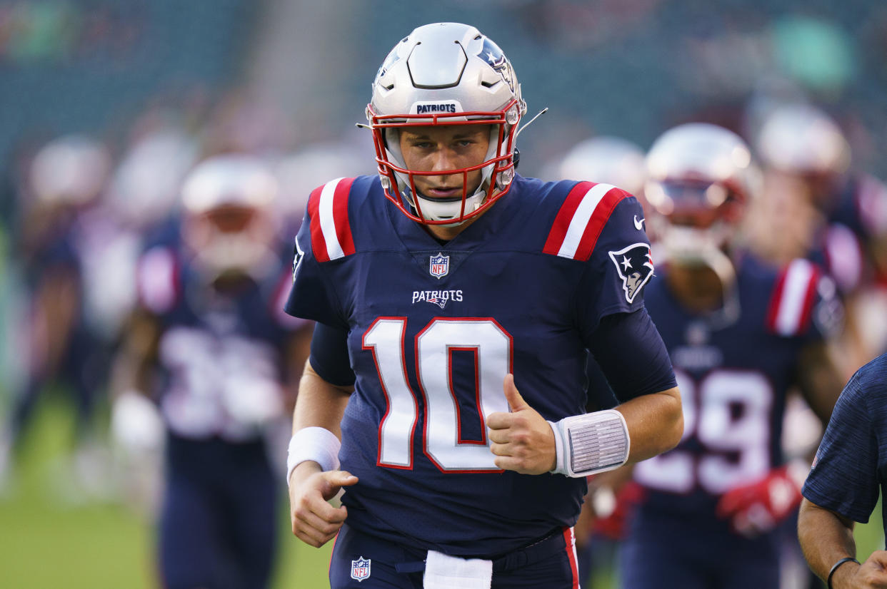 With Cam Newton out the next few practices, Mac Jones has a good opportunity to gain ground in the Patriots' quarterback battle. Just ask Bill Belichick. (AP Photo/Chris Szagola)